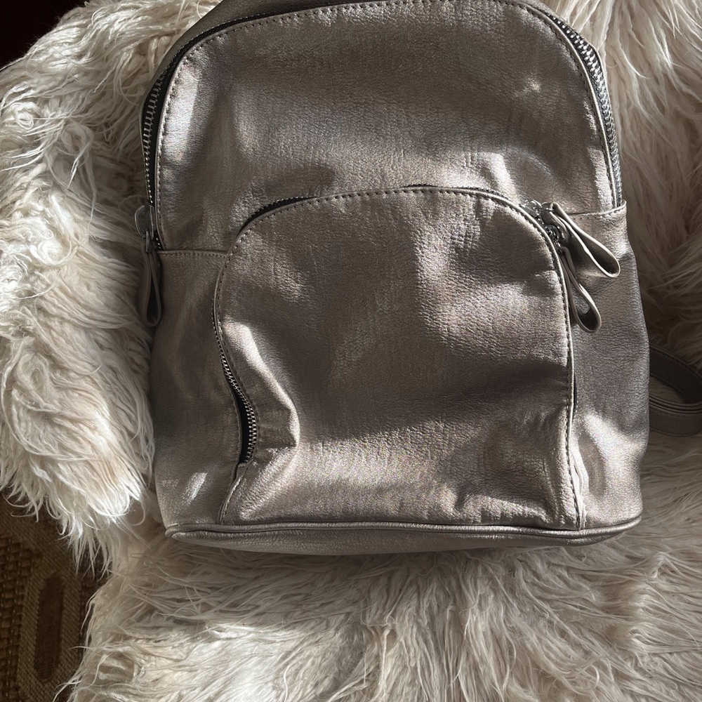 Metallic  rose gold leather backpack